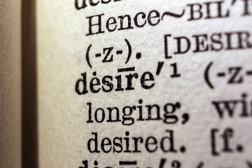 Word desire on dictionary page, macro close-up - obrazy, fototapety, plakaty