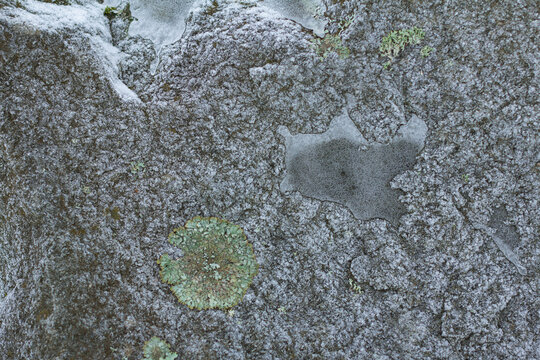 frozen surface of a rock