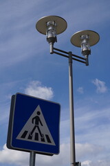 street sign on the blue sky