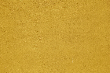 The wall surface is covered with orange plaster.