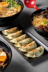 Delicious Gyozas service with ramen