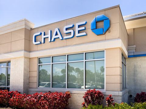 PORT CHARLOTTE, FLORIDA - MARCH 25 2024 : Chase bank building storefront facade with logo. JPMorgan Chase Bank is an American national bank with headquarters in New York City.