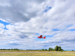 Propeller plane Aeroprakt-32L takes off from the airport