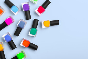 Pattern background of bottles colorful nail polish, top view, copy space