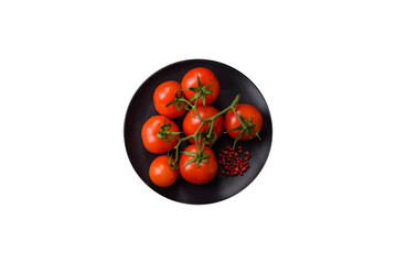 Fresh red cherry tomatoes on a branch on a dark concrete background - 767324964