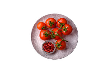 Fresh red cherry tomatoes on a branch on a dark concrete background - 767324994