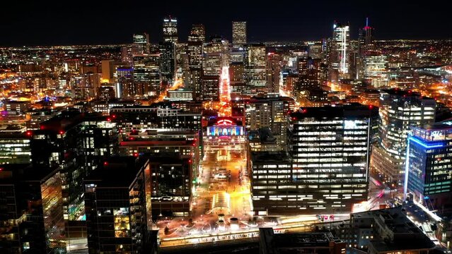Aerial Lockdown Time Lapse Shot Of Illuminated Buildings In Residential City Against Clear Sky At Night - Denver, Colorado