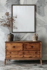 Wooden cabinet, dresser against concrete wall with empty blank mock-up poster frame with copy space, 