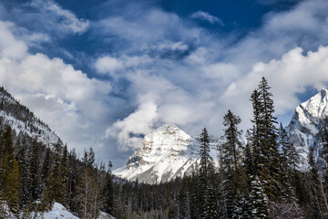 Traveling through Rocky Mountain Winter Mountain Scene