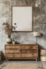 Wooden cabinet, dresser against concrete wall with empty blank mock-up poster frame with copy space, 