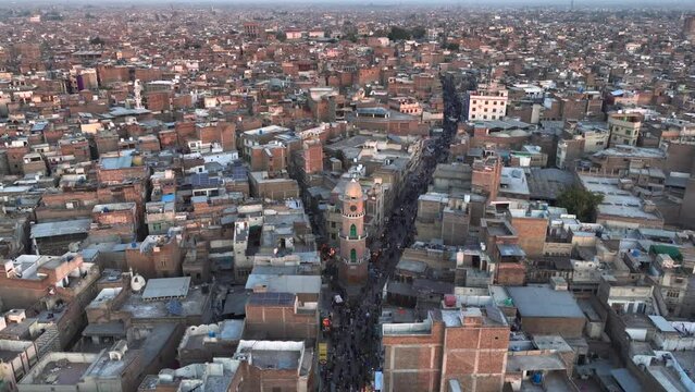 Cunningham Clock Tower on Streets of Peshawar, Pakistan. Downtown City Center Drone view Aerial Evening twilight Shot