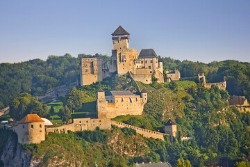 Fototapeta na wymiar Vintage Trencian Castle.Medieval castle on a cliff in Trencin, Slovakia