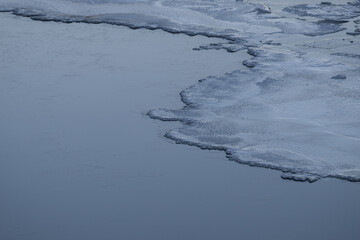 Ice melting in a flowing river