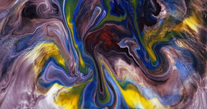 Abstract art of painting. Free flow of blue, red and yellow paint on a black background. Magical flow and waving of flowers. Fluid art painting.