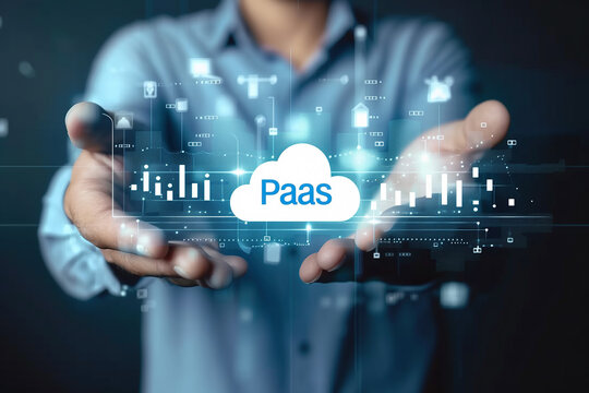 A man in a business suit holding a cloud with the word PAAS inside, symbolizing Platform as a Service analysis.