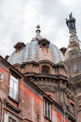 The obelisk of San Gennaro and the cupola of the chapel of San Gennaro in the historical centre of Naples, Italy - 767361135