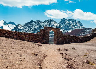Stunning stone gate that marks the border between the Red Valley (valle rojo) and Vinicuca complex, Cusco region, Peru