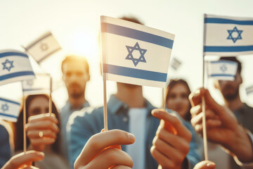 A group people holding up flags with the word Israel on them - obrazy, fototapety, plakaty