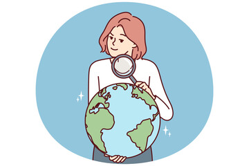 Woman with magnifying glass holds globe studying geography or choosing place for further travel. Inquisitive girl leads country search on globe for concept of international political relations