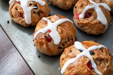 Homemade traditional hot cross buns with fruit and raisins. - 767370902
