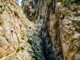 Man is experiencing and exciting vertical climb in the beautiful scenery of fara san martino gorges, Majella National Park, Abruzzo, Italy
- 767371103