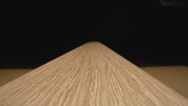 Texture of various types of wood, close-up. House wood pattern background. Wooden MDF panel, close-up, furniture production. Brown wooden background.