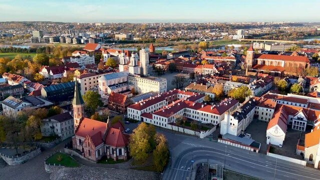 Kaunas old town panorama, Lithuania. 4K aerial view footage of Kaunas city center with many old red roof houses, churches. Drone video