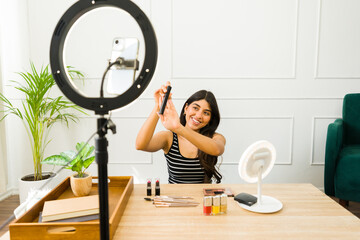 Beauty blogger recording makeup tutorial