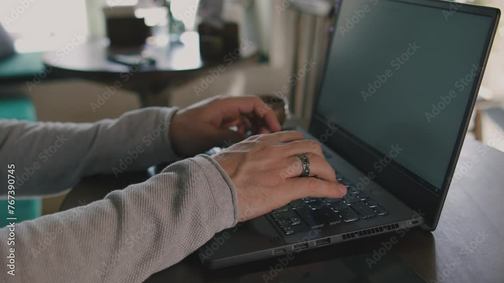 Wall mural close up of freelancer's developer hands typing program code on laptop keyboard in coworking. busine