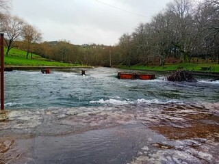 Río Deza desbordado en Lalín, Galicia
