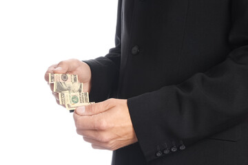 Business man holding money on white background
