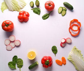 Flat lay different vegetables on white background, copy space. Food concept.