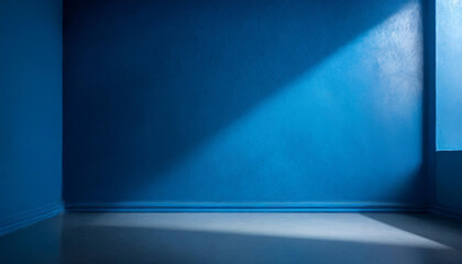 Minimal abstract simple light blue background for product presentation. Shadow and light from windows on plaster wall.