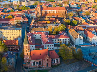 Fototapeta na wymiar Kaunas old town panorama, Lithuania. Drone aerial view photo of Kaunas city center and Vytautas Magnus church