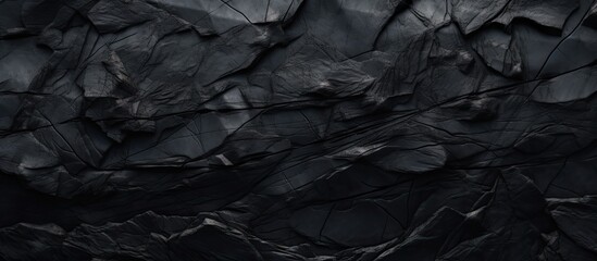 An image showcasing a detailed close-up of a solid black rock wall featuring a conspicuous white clock - obrazy, fototapety, plakaty