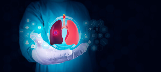 The doctor analyzes lung cancer, through a hologram of the lungs in his hand. Doctor isolated on...