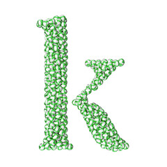 Symbol made of green volleyballs. letter k