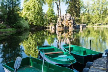 Tranquil Day at Rybárska Bašta: Enjoying Rajecke Teplice, Slovakia Spa Park with Small Boats on the Serene Lake