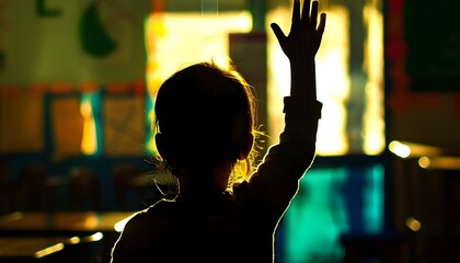 Unrecognized girl raising hand to participate in her class