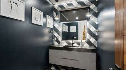 Modern well-lit bathroom with black and white geometric walls