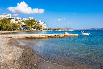 Idyllic beach in Adamas port bay, Milos island, Cyclades, Greece - 767422540