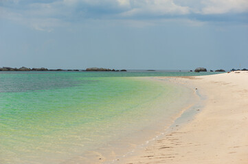 Nice white sand beach with calm turquoise blue water with huge granite stone Pantai Mabai, Belitung, Sumatera, Indonesia