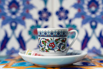 Turkish Coffee Cup and Turkish Delight on the Background of Ottoman Tile Motifs, Üsküdar Istanbul, Turkiye (Turkey)