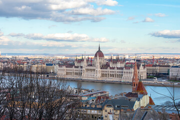 Aerial view on Parliament building, Danube River and City at sunset in Budapest, Hungary. High angle view of buildings and town