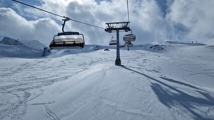 Fototapeta na wymiar ski lift chairs