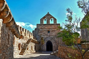 Old medieval church on Majorca with bell towers built of stone