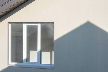 Building under construction and roof's shadow