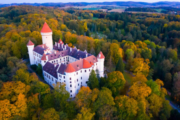 Picturesque autumn landscape with the imposing historical Konopiste castle near the small Czech...