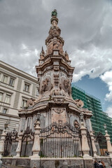 Fototapeta na wymiar The Obelisk of the Immaculate Conception is a Baroque obelisk in Naples