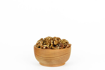 walnuts in small wooden cup